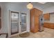 The kitchen features tiled floors, wooden cabinets, stainless steel appliances and access to the outside at 8521 Caitlin Ct, Hudson, FL 34667