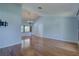 Bright living room showcasing hardwood floors and lots of natural light at 8521 Caitlin Ct, Hudson, FL 34667