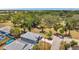 Aerial view of a home adjacent to a park, offering a serene and nature-filled setting at 8608 N Arden Ave, Tampa, FL 33604