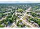 An aerial view shows the neighborhood's layout and landscaping at 9266 Century Dr, Spring Hill, FL 34606