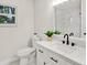 Bright bathroom features a marble countertop and a modern sink at 9266 Century Dr, Spring Hill, FL 34606