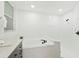 Bathroom features a soaking tub and a shower at 970 Ridgewood Ter, Tarpon Springs, FL 34689