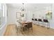 Bright dining area features hardwood floors and lots of natural light at 970 Ridgewood Ter, Tarpon Springs, FL 34689