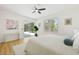 Serene main bedroom with sliding glass doors to the pool area and ample natural light at 970 Ridgewood Ter, Tarpon Springs, FL 34689