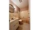 Pink bathroom featuring a vintage sink, toilet, and bathtub at 1002 W Pinedale Dr, Plant City, FL 33563