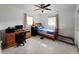 Bedroom features natural lighting, a ceiling fan, and neutral walls at 11735 86Th Ave, Seminole, FL 33772