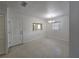 Bright dining room with terrazzo floors, decorative light fixture, and natural light at 11735 86Th Ave, Seminole, FL 33772