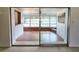 Enclosed sunroom with ample windows, brick accents, and tile flooring, ideal for enjoying natural light at 11735 86Th Ave, Seminole, FL 33772
