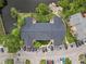 Aerial view of a multi-unit dwelling highlighting the roof and surrounding landscaping and parking at 11901 4Th N St # 5111, St Petersburg, FL 33716