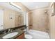 Well-maintained bathroom featuring granite countertop, modern fixtures, and a tiled shower-tub combo at 11901 4Th N St # 5111, St Petersburg, FL 33716