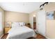 Cozy bedroom with natural light, complemented by a plush bed and minimalist decor at 11901 4Th N St # 5111, St Petersburg, FL 33716