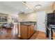 Open floorplan featuring the kitchen with stainless steel appliances flowing into the living area at 11901 4Th N St # 5111, St Petersburg, FL 33716