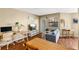 Cozy living space featuring stylish decor, wood-look flooring, and lots of natural light at 11901 4Th N St # 5111, St Petersburg, FL 33716