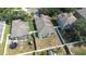 Aerial view of a single-Gathering home with fenced-in yard, patio, and mature trees at 12136 Luftburrow Ln, Hudson, FL 34669