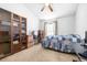 Bedroom with a window, boxes, and a bed at 12136 Luftburrow Ln, Hudson, FL 34669