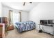 Bedroom with a window, boxes, and a bed at 12136 Luftburrow Ln, Hudson, FL 34669