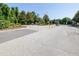Gated entrance to the community features manicured landscaping and controlled access at 12136 Luftburrow Ln, Hudson, FL 34669