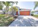Attractive single-Gathering home with a long driveway and a two-car garage in a Gathering-friendly neighborhood at 12136 Luftburrow Ln, Hudson, FL 34669