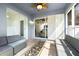 Enclosed lanai offers a relaxing space with outdoor access and ample natural light at 12136 Luftburrow Ln, Hudson, FL 34669