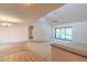 Spacious living room with neutral carpet and sliding glass doors that lead to an outdoor area at 1228 Rainbrook Cir, Valrico, FL 33596