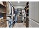 Spacious walk-in closet boasts ample storage, shelving, and hanging space at 12957 Satin Lily Dr, Riverview, FL 33579