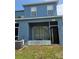 The back of the property showcases a covered patio, air conditioning unit and private outdoor space at 13157 Kings Crossing Dr, Gibsonton, FL 33534