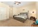 Bedroom featuring a ceiling fan, a window, and space for various furniture at 13803 Chalk Hill Pl, Riverview, FL 33579