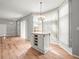 Bright dining area with hardwood floors, pendant lighting, and ample natural light at 14134 Trouville Dr, Tampa, FL 33624