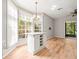 Bright dining area with hardwood floors and natural lighting at 14134 Trouville Dr, Tampa, FL 33624