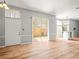 Bright living room with sliding glass doors and lovely hardwood floors at 14134 Trouville Dr, Tampa, FL 33624