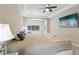 Spacious bedroom with a trey ceiling and carpeted floors at 14715 Fishhawk Preserve Dr, Lithia, FL 33547