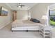 Spacious bedroom with a trey ceiling, and carpeted floors at 14715 Fishhawk Preserve Dr, Lithia, FL 33547