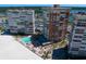 Aerial view of a beachfront condo complex with pool and beach access in a desirable location at 17920 Gulf Blvd # 1806, Redington Shores, FL 33708