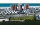 Scenic aerial view of condos and beach featuring parking, recreation space, and waterfront access at 17920 Gulf Blvd # 1806, Redington Shores, FL 33708