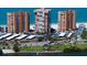 Stunning aerial view of beachfront high-rise condos overlooking a pristine sandy beach and the Gulf at 17920 Gulf Blvd # 1806, Redington Shores, FL 33708