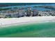 Stunning aerial shot showcases beachfront condos, turquoise waters, and pristine sandy beaches, ideal for relaxation at 17920 Gulf Blvd # 1806, Redington Shores, FL 33708