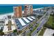 Aerial view of the area showing the beach, nearby buildings and covered parking at 17920 Gulf Blvd # 1806, Redington Shores, FL 33708