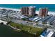 Panoramic aerial view of condo complex and ocean featuring lush landscaping and beachfront access at 17920 Gulf Blvd # 1806, Redington Shores, FL 33708