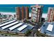 Stunning aerial showing beach condos with parking and community recreation area, including beaches and waterways at 17920 Gulf Blvd # 1806, Redington Shores, FL 33708