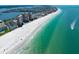 Expansive beachfront with turquoise waters, showcasing luxurious condos and beautiful coastal living at 17920 Gulf Blvd # 1806, Redington Shores, FL 33708