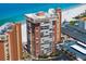 Aerial view of a condo complex with ample parking, close beach access, and stunning views at 17920 Gulf Blvd # 1806, Redington Shores, FL 33708