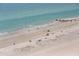 Beautiful sandy beach with clear turquoise water, ideal for swimming and sunbathing at 17920 Gulf Blvd # 1806, Redington Shores, FL 33708