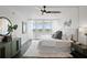 Beautifully designed bedroom with a modern aesthetic, balcony access, and chic furnishings at 17920 Gulf Blvd # 1806, Redington Shores, FL 33708