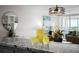 Kitchenette showing counter with glass drink pitcher, open to living room at 17920 Gulf Blvd # 1806, Redington Shores, FL 33708