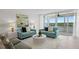 Inviting living room with stylish sofas, a modern coffee table, and an open, airy feel at 17920 Gulf Blvd # 1806, Redington Shores, FL 33708
