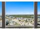 Breathtaking view from a high-rise condo, showcasing a coastal city, waterways, and lush greenery at 17920 Gulf Blvd # 1806, Redington Shores, FL 33708
