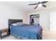 This bedroom offers a ceiling fan and closet for your storage needs at 1818 Willow Oak Dr, Palm Harbor, FL 34683