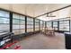 The sunroom offers plenty of natural light and views of the outdoors, ideal for relaxation or entertainment at 1818 Willow Oak Dr, Palm Harbor, FL 34683