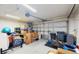 Well-lit garage with ample storage space, providing secure parking and room for organizing belongings at 19635 Bellehurst Loop, Land O Lakes, FL 34638