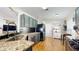 Modern kitchen featuring granite countertops, stainless steel appliances, and plenty of cabinet space at 19635 Bellehurst Loop, Land O Lakes, FL 34638